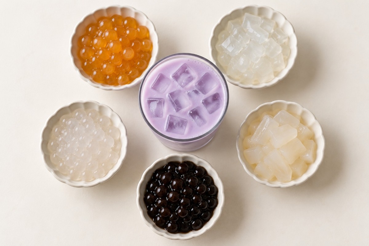 Honey boba, aloe jelly, crystal boba, lychee jelly and tapioca for lavender tea