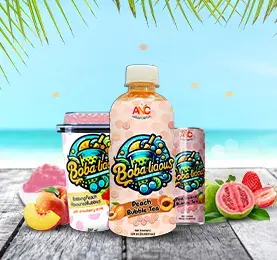 Bobalicious peach bubble tea drinks in cup, can, and bottle packaging displayed with tropical fruits by the beach.