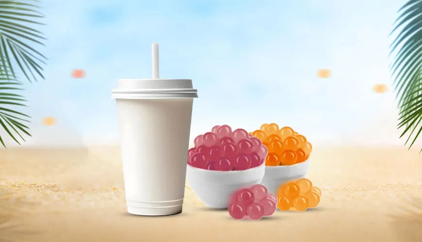 Bubble tea cup with colorful popping boba on a tropical beach background.